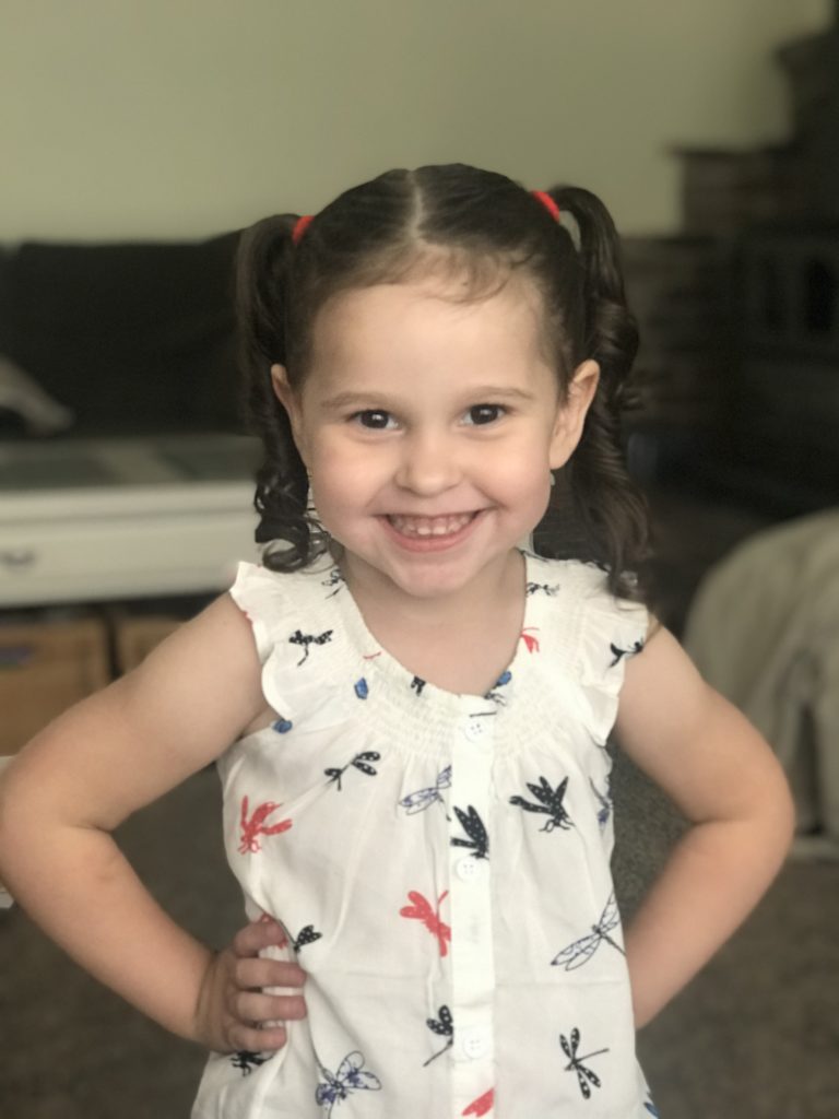 Toddler girl with pigtails
