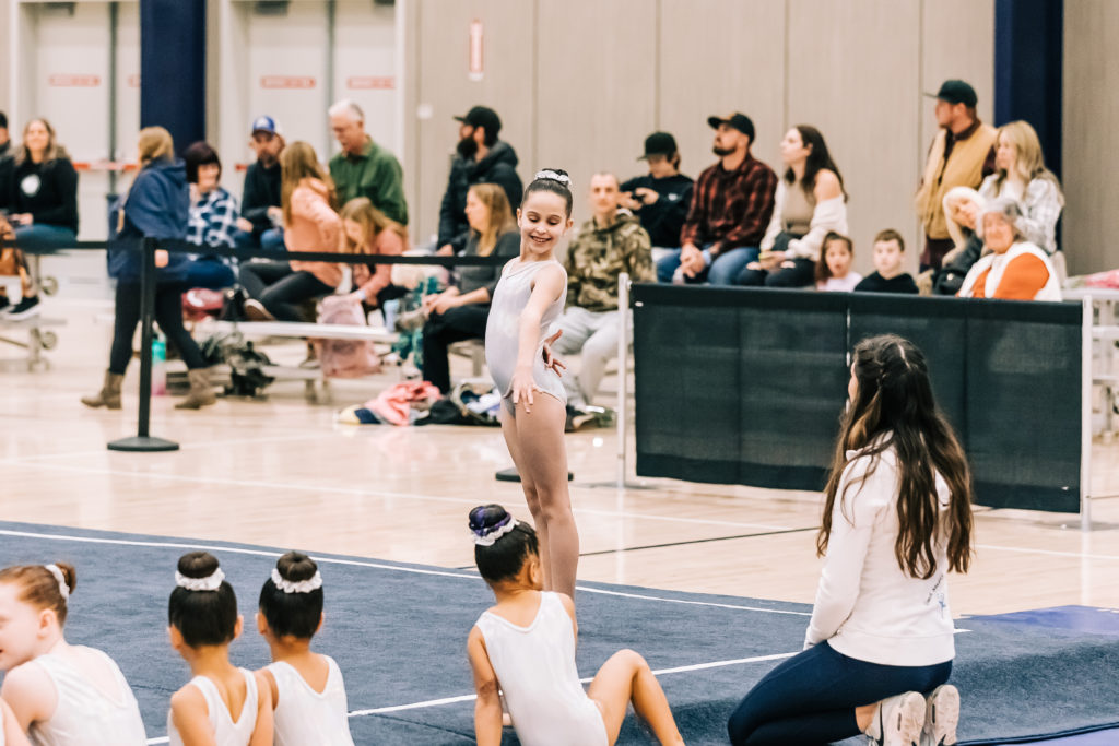 Blog: Young gymnast preparing to start her floor routine