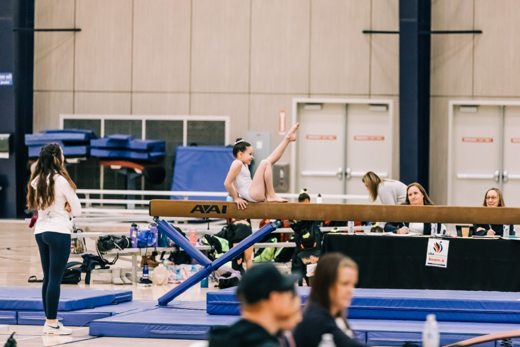 Blog: Young gymnast doing her beam routine