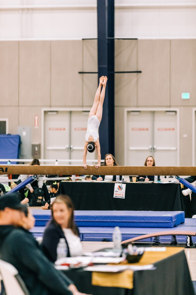 Blog: Young gymnast doing her beam routine