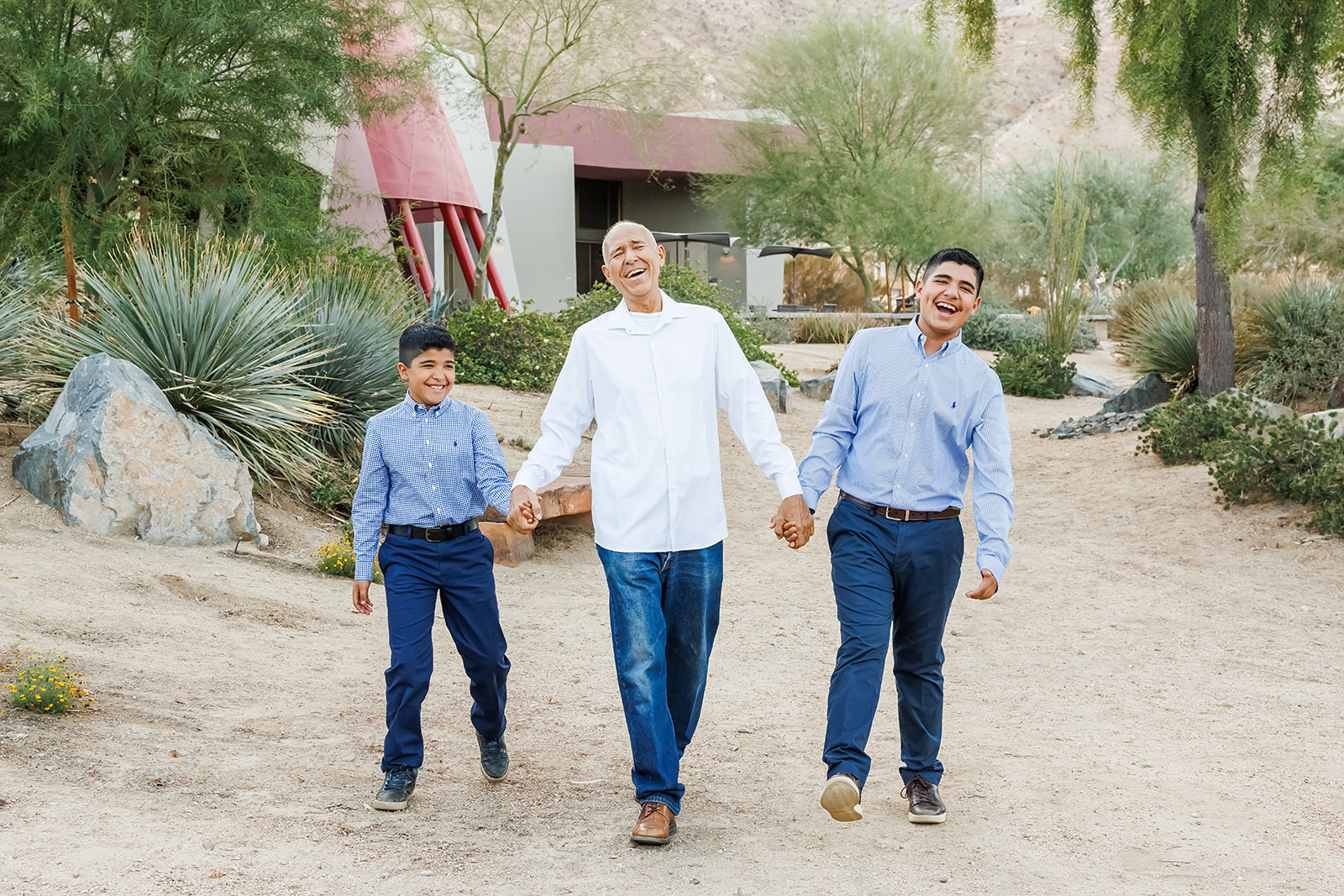 Grandpa and children walking and laughing is a great heading image for why portraits matter.