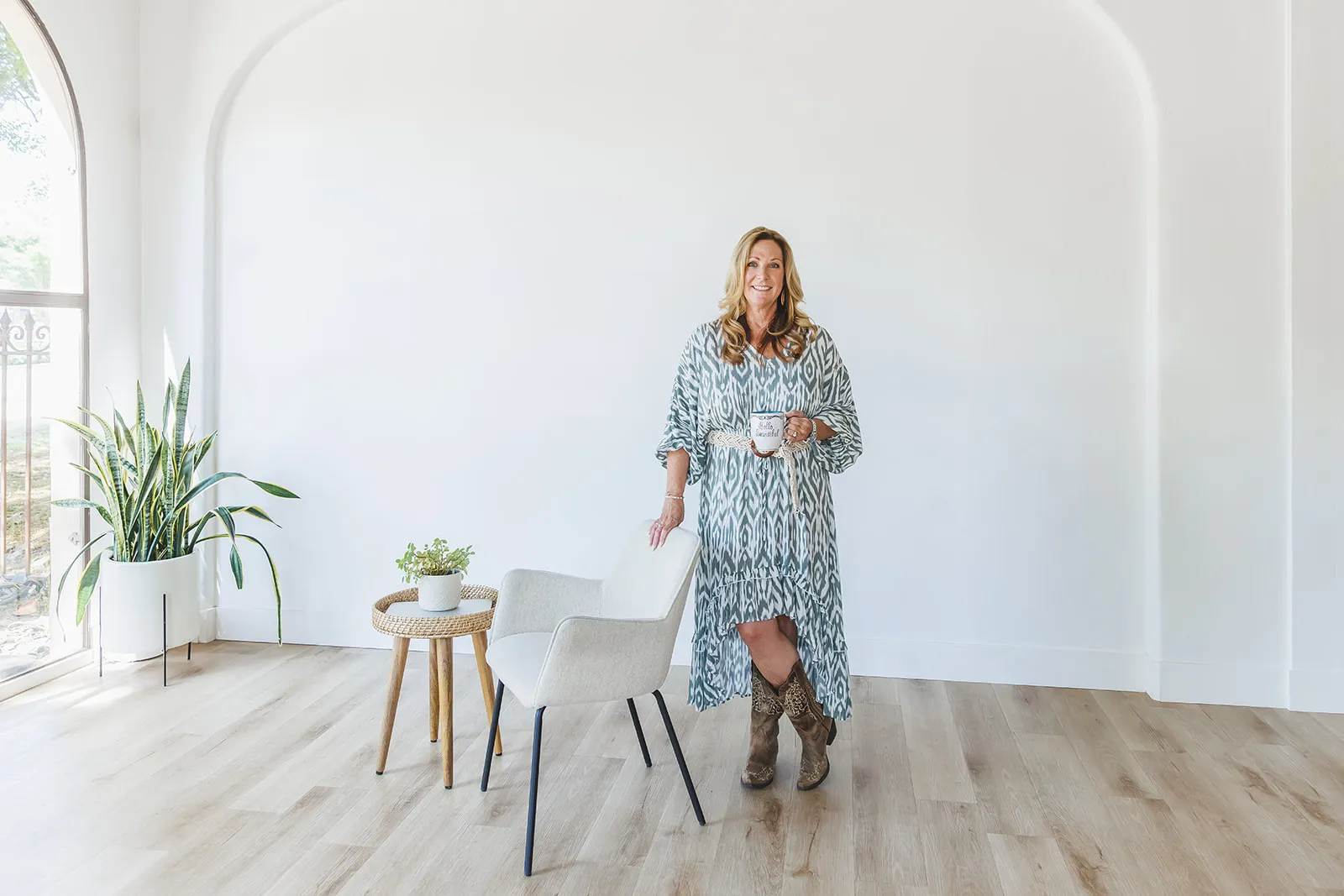 Brand photography session with Jeanene with Essential Key Hypnotherapy in Folsom CA at Mind Garden Folsom. Wide shot of Jeanene with her office.