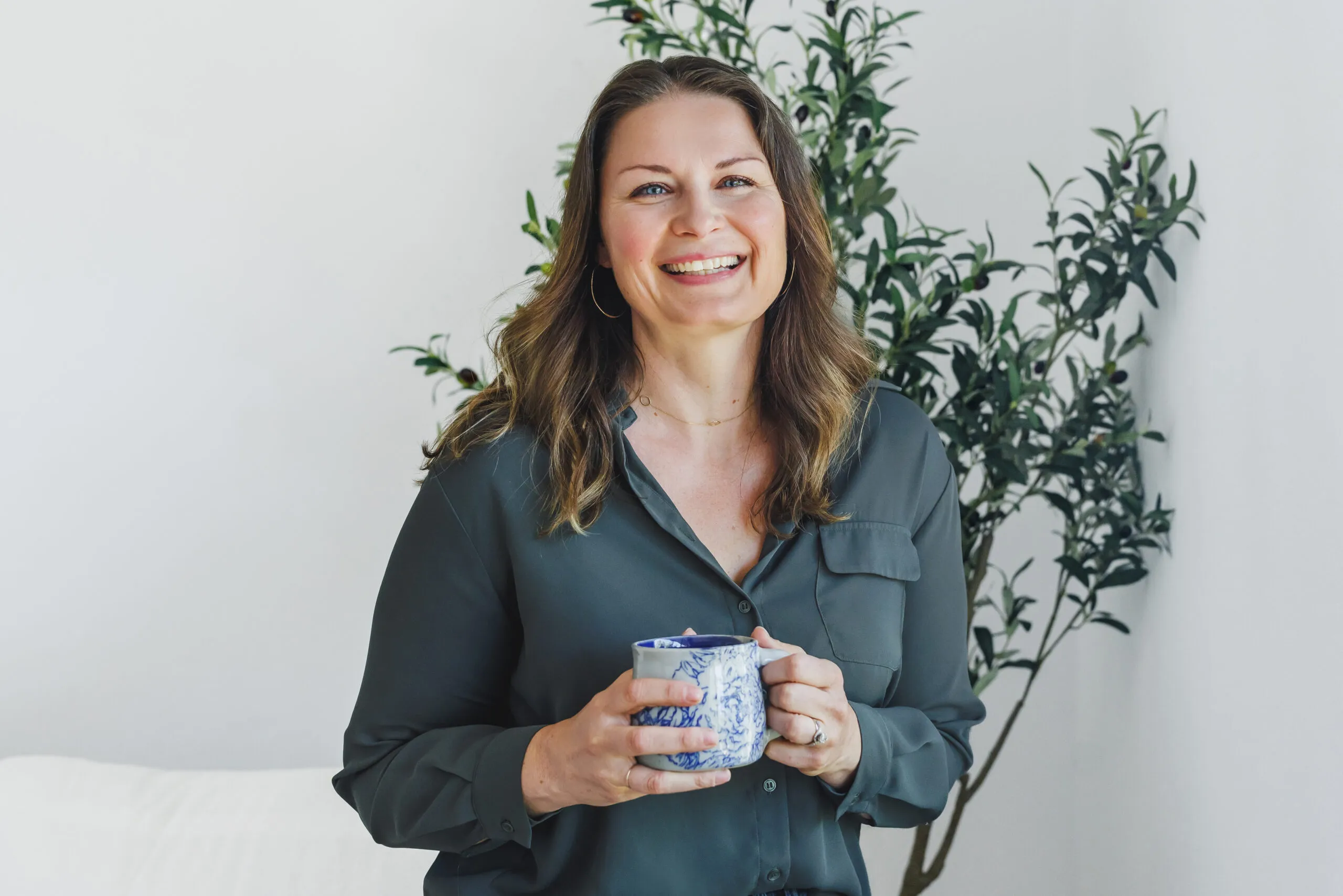 Business brand photography image of woman in green shirt by Ann Keen Photography in Auburn, CA